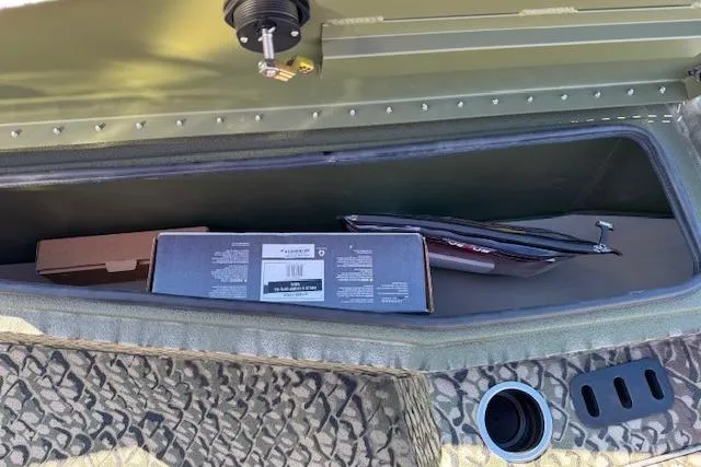 Slide: The Image of Storage compartment in 2026 Vexus ACX 2000 boat with boxes and accessories. - 16