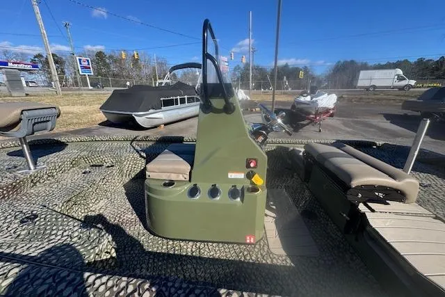 Slide: The Image of 2026 Vexus ACX 2000 boat interior with camouflage design and seating. - 20