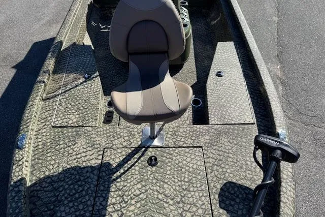 Slide: The Image of 2026 Vexus ACX 2000 fishing boat with textured deck and Garmin equipment. - 6