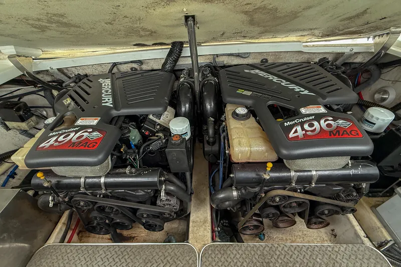 Slide: The Image of Twin MerCruiser 496 MAG engines in a 2004 Formula 330 Sun Sport boat. - 20