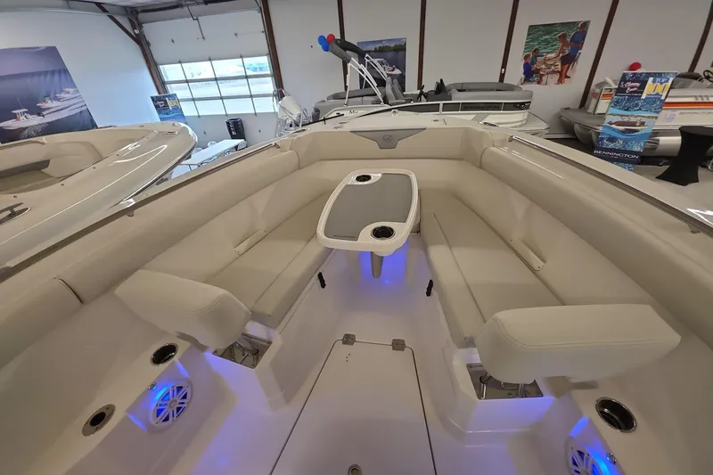 Slide: The Image of Luxurious interior of 2026 Sailfish 272 CC boat with plush seating and ambient lighting. - 25