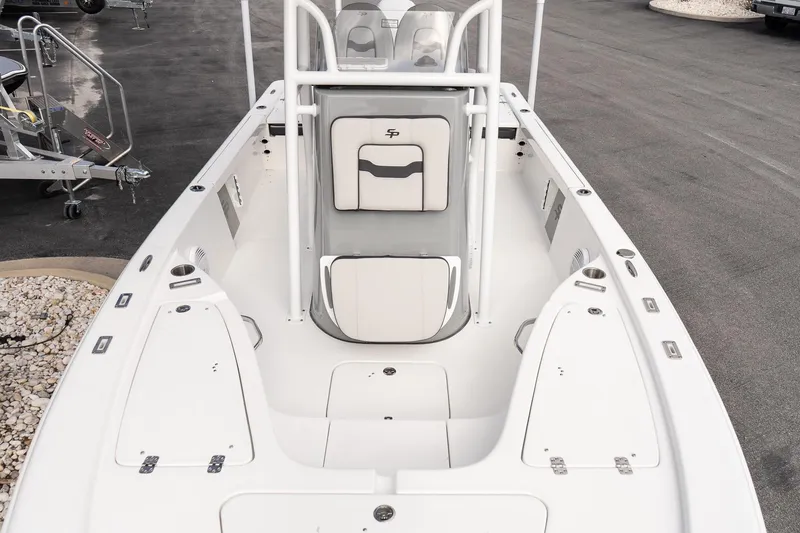Slide: The Image of 2025 Sea Pro 230 Bay boat interior, featuring spacious seating and storage compartments. - 15