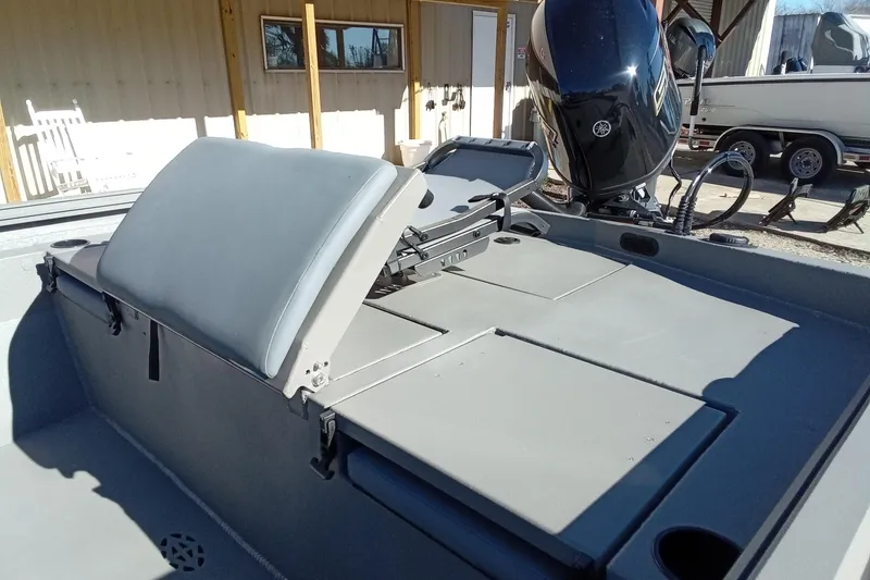 Slide: The Image of 2026 Thor 1900 Lake Hammer boat interior with seating and motor. - 10