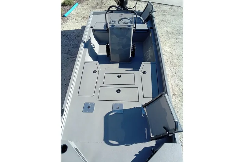 Slide: The Image of 2026 Thor 1900 Lake Hammer boat interior with storage compartments and steering console. - 28