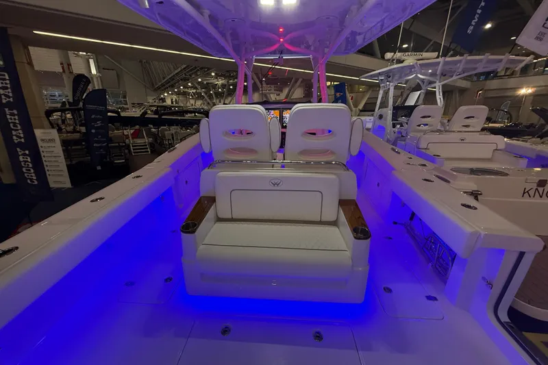 Slide: The Image of 2026 Southport 30 FE boat interior with sink, toilet, and wooden flooring. - 10