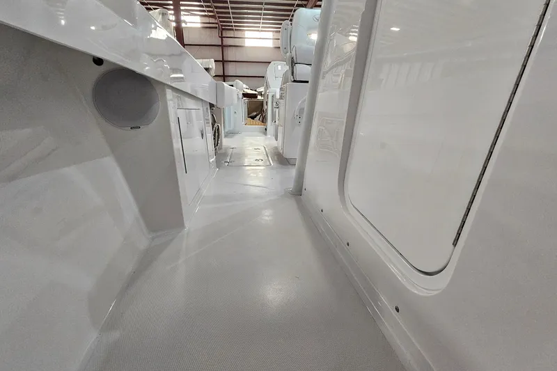 Slide: The Image of 2026 Southport 30 FE boat interior with sink and control panel. - 13