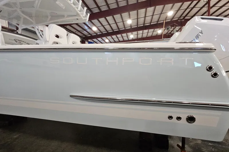 Slide: The Image of 2026 Southport 30 FE boat engine area on stands in a workshop. - 37