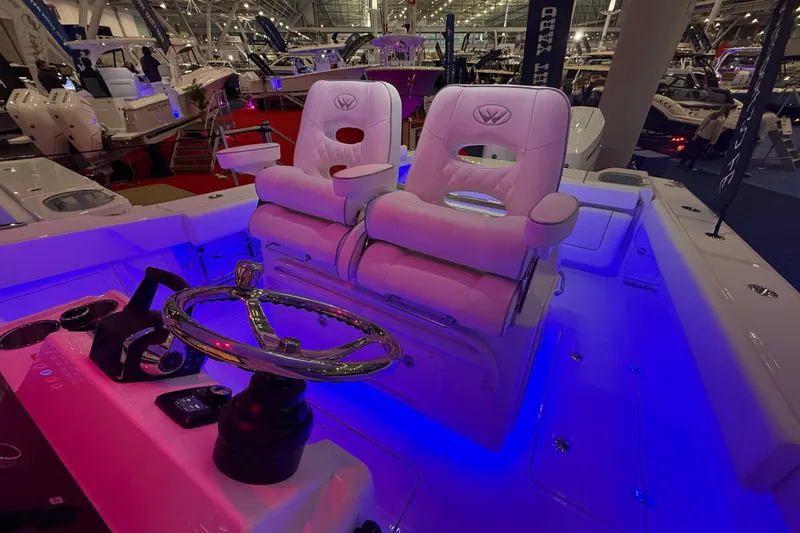 Slide: The Image of Open storage compartment on 2026 Southport 30 FE boat, showcasing interior space. - 6