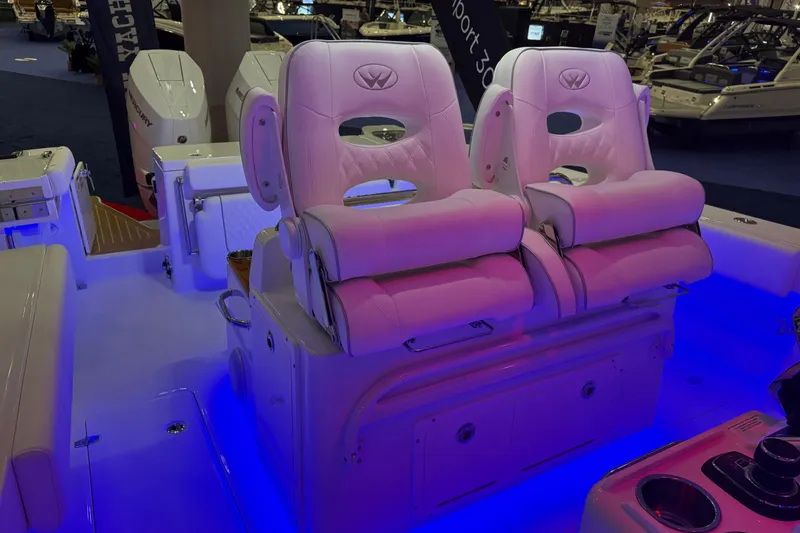 Slide: The Image of 2026 Southport 30 FE boat interior with white cushioned seating and sleek design. - 7