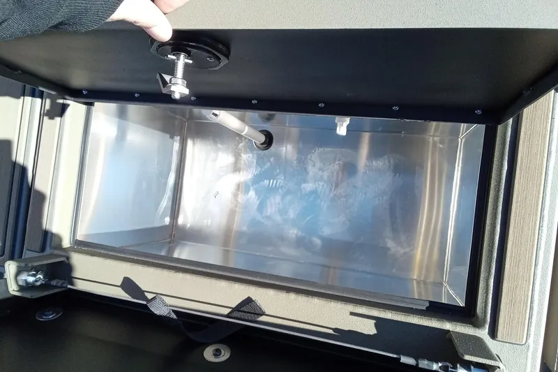 Slide: The Image of Open storage compartment in 2026 Thor 1900 Lake Hammer boat. - 15