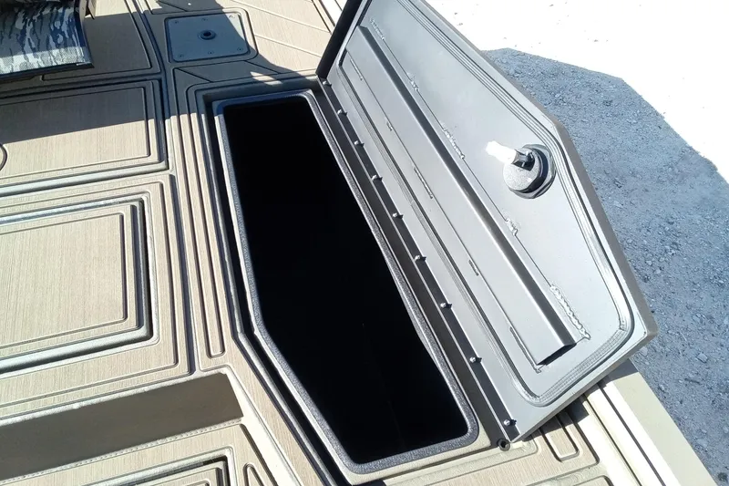 Slide: The Image of Open storage compartment on 2026 Thor 1900 Lake Hammer boat deck. - 20
