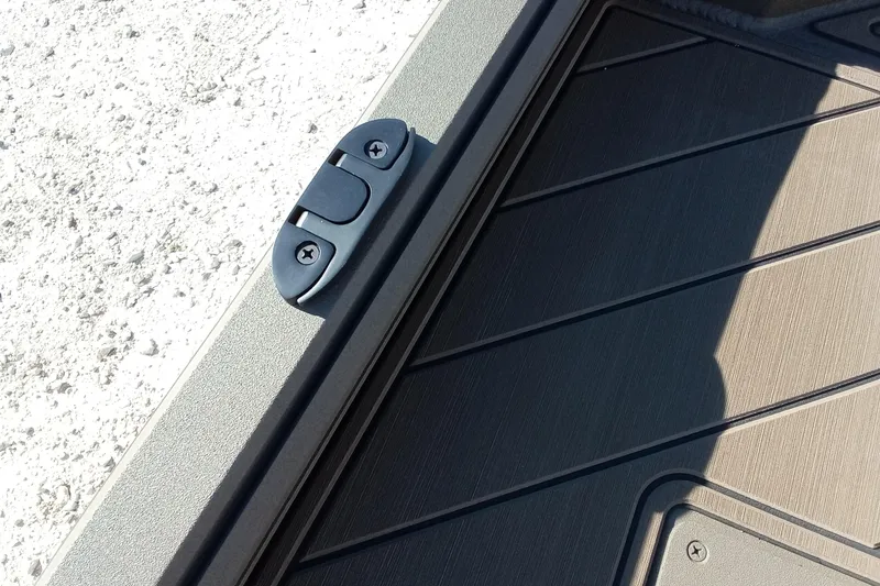 Slide: The Image of Close-up of 2026 Thor 1900 Lake Hammer boat deck with textured surface and latch. - 23