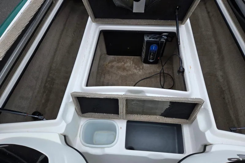 Slide: The Image of 2008 Nitro Z-6 boat interior with storage compartments and electronic equipment. - 15