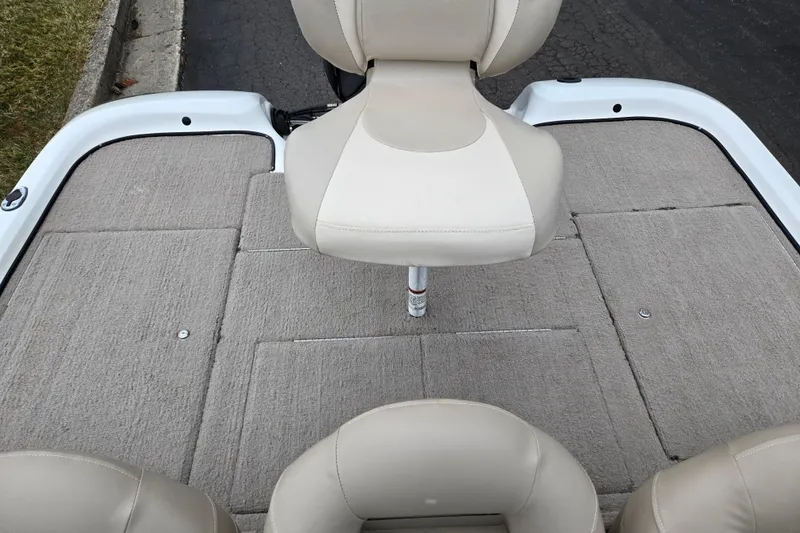 Slide: The Image of 2008 Nitro Z-6 boat interior with beige seating and carpeted deck. - 20