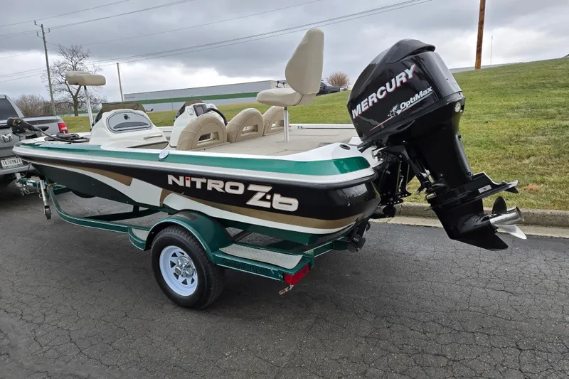 Slide: The Image of 2008 Nitro Z-6 boat with Mercury OptiMax engine on a trailer. - 3