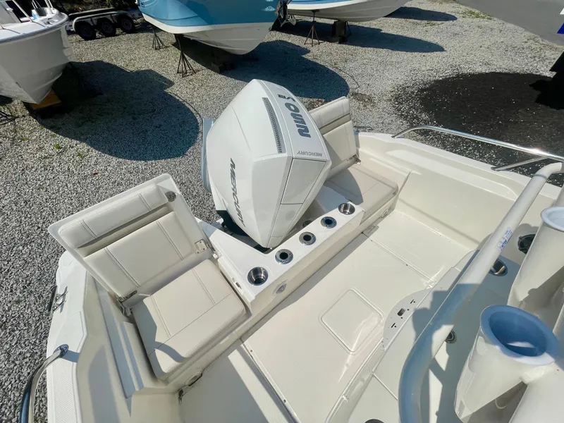Slide: The Image of Boston Whaler 220 Dauntless 2026 with spacious cockpit and powerful outboard motor. - 3