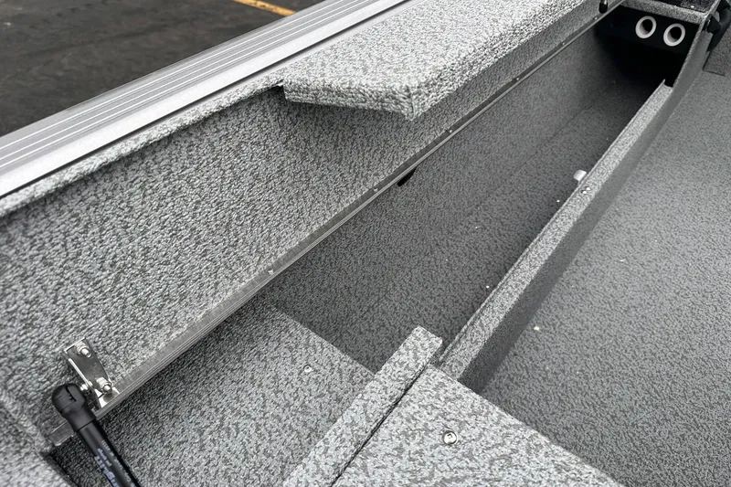 Slide: The Image of 2026 Lund 1775 Impact XS Sport boat interior with gray textured finish. - 21