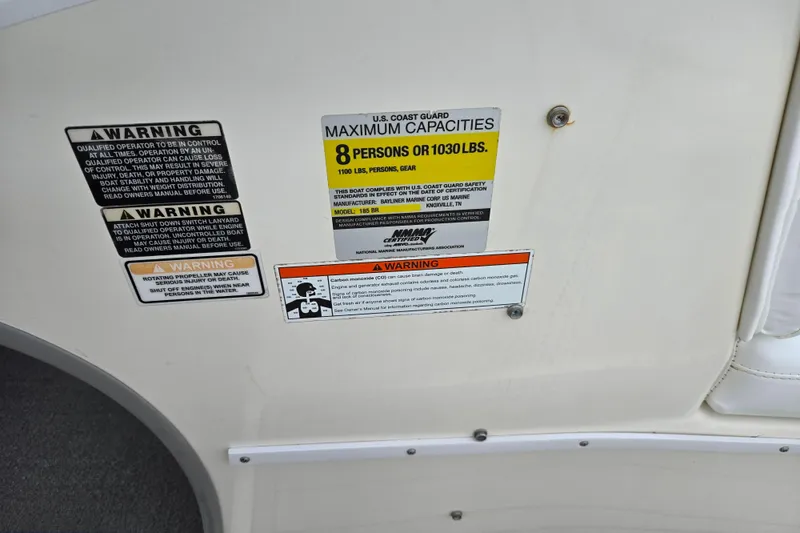 Slide: The Image of 2010 Bayliner 185 warning labels showing maximum capacity and safety instructions. - 16