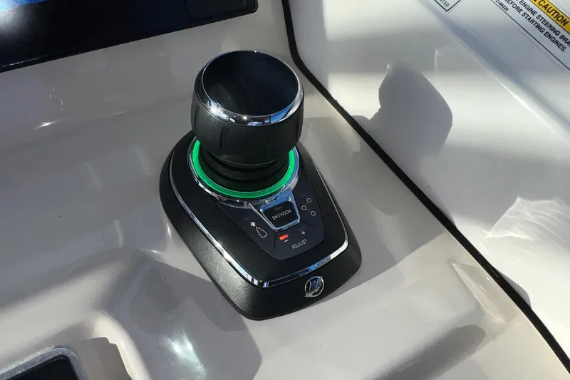 Slide: The Image of Joystick control on 2019 Boston Whaler 270 Vantage boat dashboard. - 17