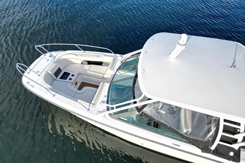 Slide: The Image of 2019 Boston Whaler 270 Vantage boat on calm water, aerial view. - 5