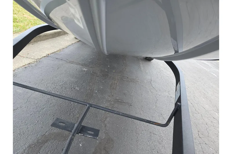 Slide: The Image of 2025 Tracker Pro 170 boat hull on trailer, close-up view. - 8