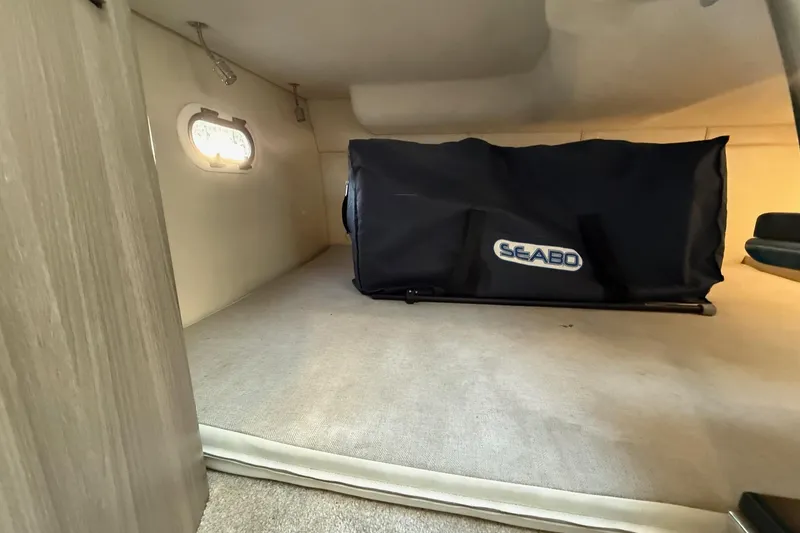 Slide: The Image of Interior cabin of 2020 Regal 26 XO boat with Seabob storage bag. - 33