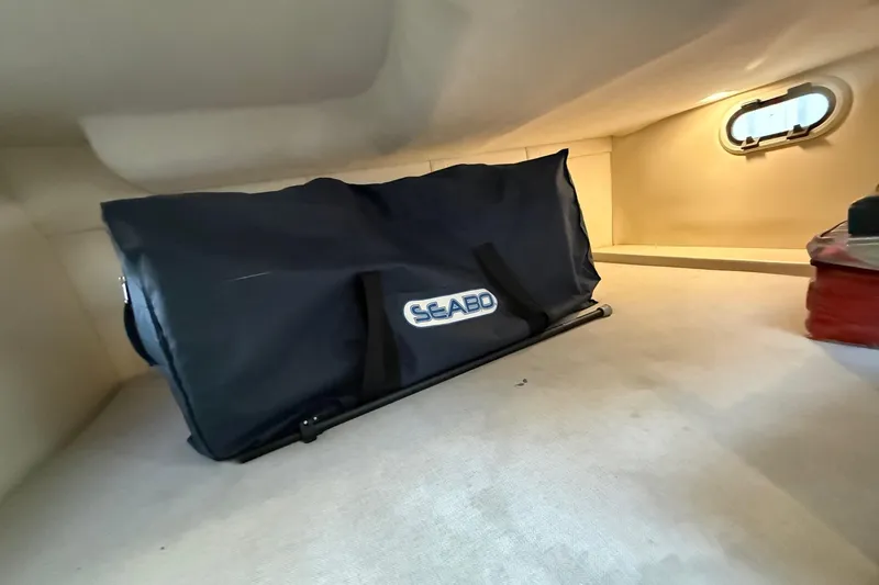 Slide: The Image of Storage area inside 2020 Regal 26 XO boat with Seabob bag. - 34