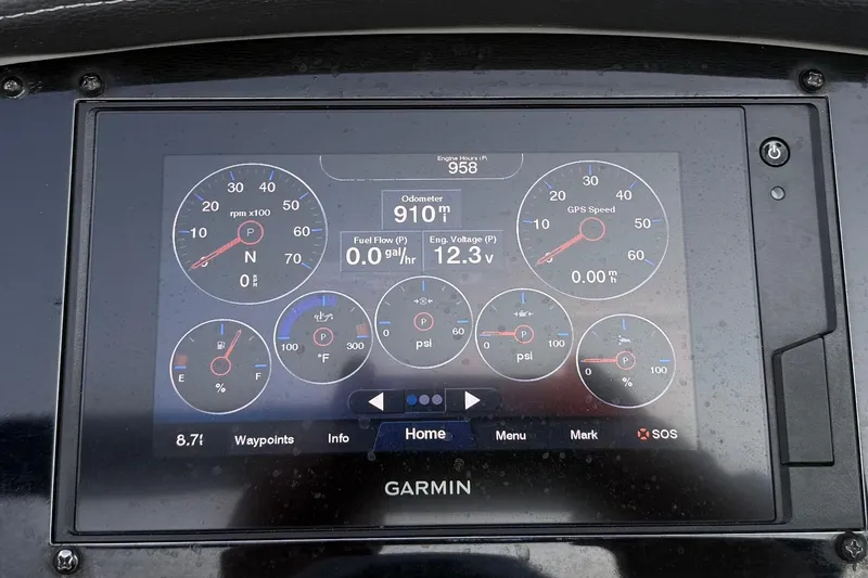 Slide: The Image of Garmin display on 2020 Regal 26 XO boat showing engine metrics and navigation data. - 8
