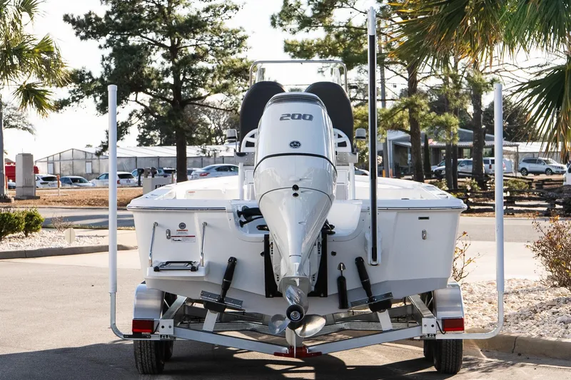 Slide: The Image of 2026 Sea Pro 230 Bay boat with 200 horsepower engine on a trailer. - 5