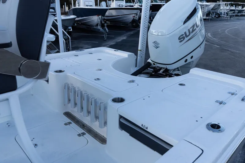 Slide: The Image of 2026 Sea Pro 230 Bay boat with Suzuki outboard motor, featuring spacious deck layout. - 8