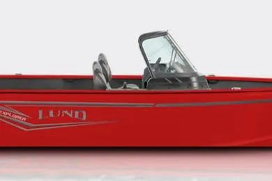 The Image of 2026 Lund 1800 Explorer Sport boat, red, covered, on trailer outside dealership. - 0