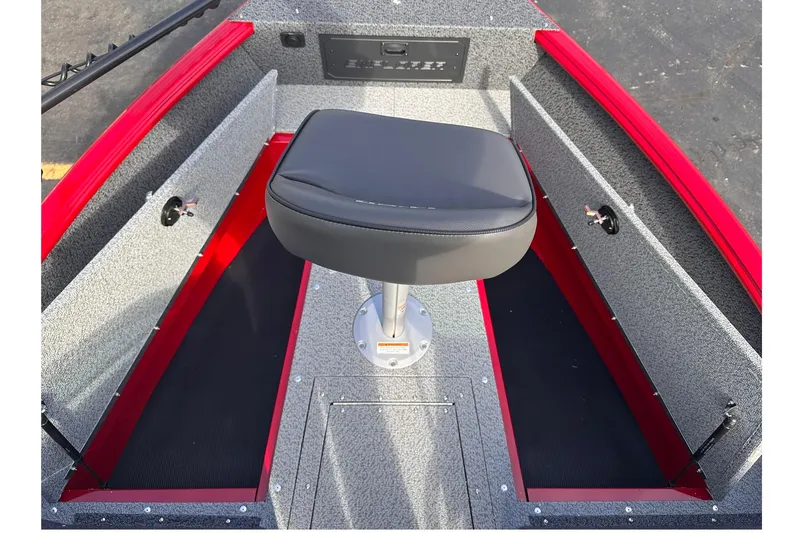 Slide: The Image of 2026 Lund 1800 Explorer Sport boat interior with gray and red seating and storage compartments. - 16