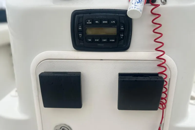 Slide: The Image of 2013 Carolina Skiff 19 Ultra Elite console with radio and safety cord. - 18