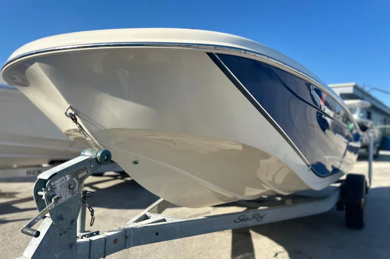 Slide: The Image of 2013 Carolina Skiff 19 Ultra Elite boat on trailer, side view. - 2