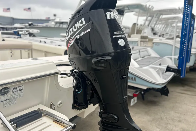 Slide: The Image of 2013 Carolina Skiff 19 Ultra Elite with Suzuki 115 outboard motor. - 23