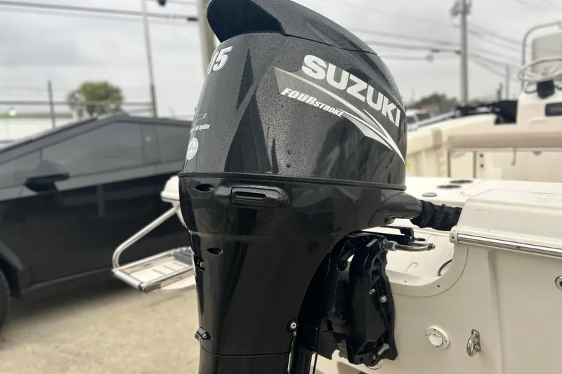 Slide: The Image of 2013 Carolina Skiff 19 Ultra Elite with Suzuki four-stroke outboard motor. - 24