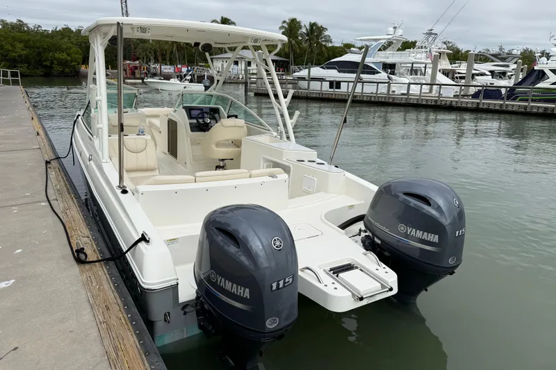 Slide: The Image of 2017 World Cat 230 SD boat docked with twin Yamaha 115 engines. - 17