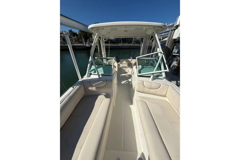 Slide: The Image of 2017 World Cat 230 SD boat interior with spacious seating and open deck. - 5
