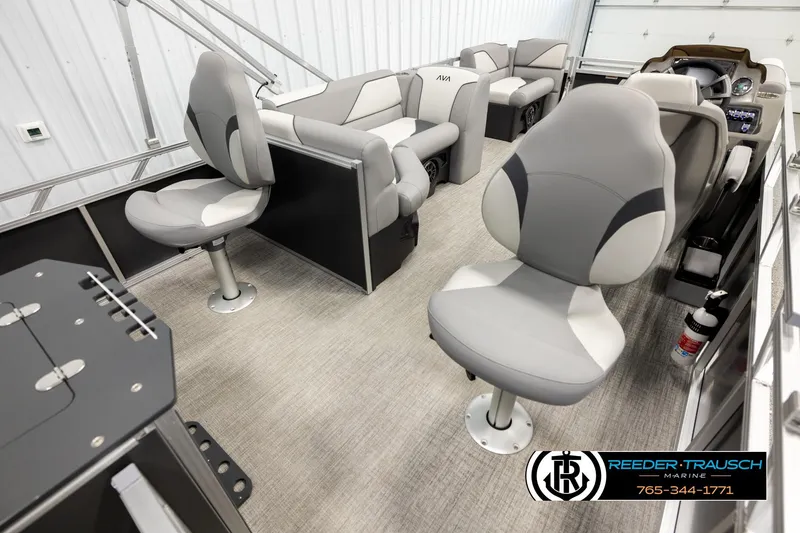 Slide: The Image of 2026 Avalon VEN RF boat interior with modern seating and steering console. - 12