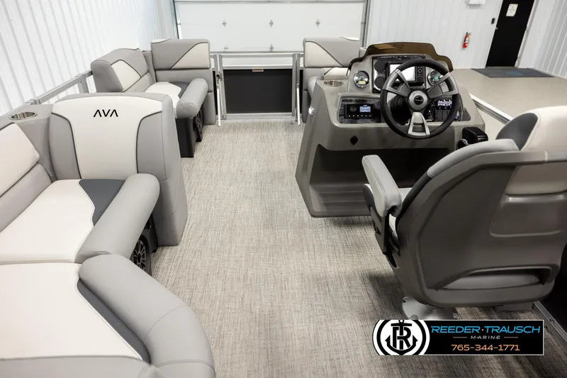 Slide: The Image of Luxurious interior of 2026 Avalon VEN RF pontoon boat with plush seating and modern helm. - 17