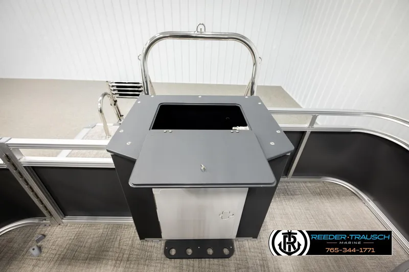 Slide: The Image of 2026 Avalon VEN RF boat deck with storage compartment and railing. - 25