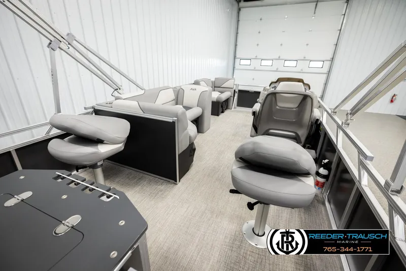Slide: The Image of 2026 Avalon VEN RF boat interior with modern seating and steering console. - 26