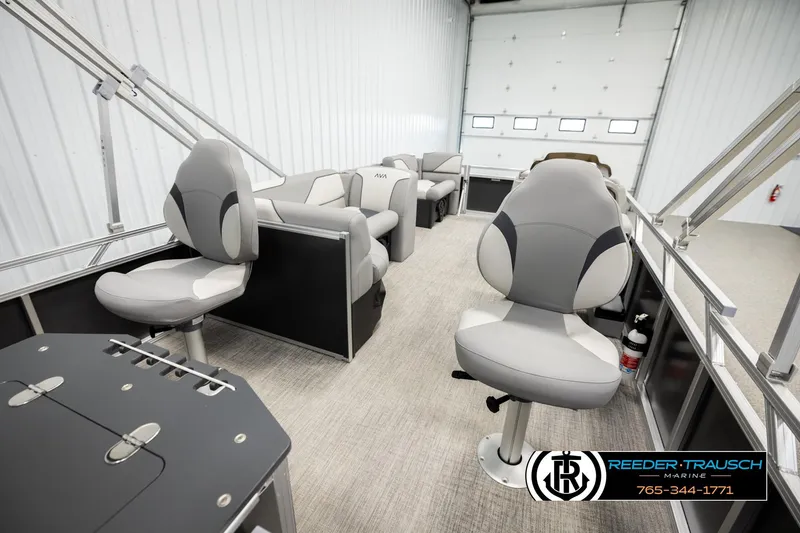Slide: The Image of Interior of 2026 Avalon VEN RF pontoon boat with modern seating and sleek design. - 27
