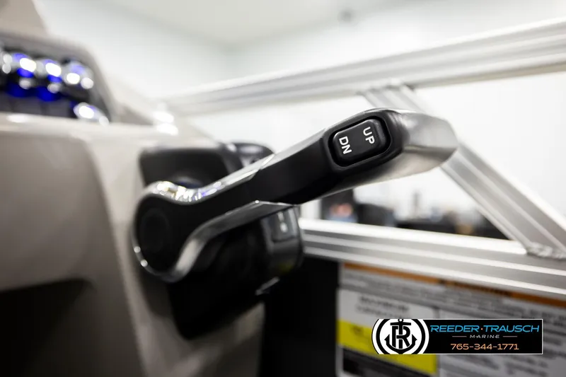 Slide: The Image of Close-up of Avalon VEN RF 2026 boat throttle lever with "UP" and "DN" buttons. - 36