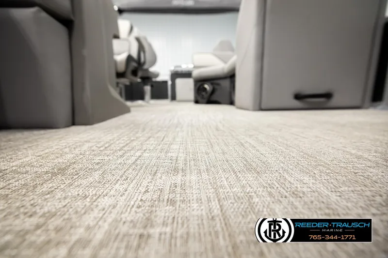 Slide: The Image of Luxurious interior of 2026 Avalon VEN RF boat with plush seating and carpet flooring. - 46