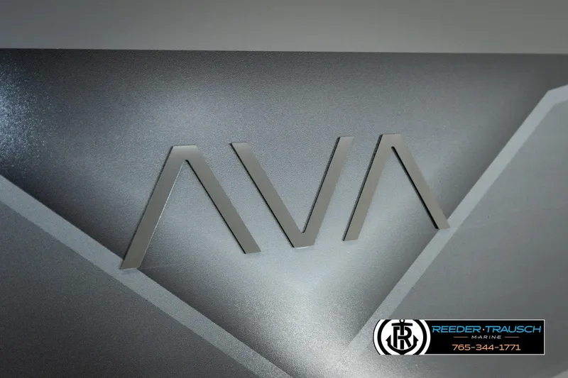 Slide: The Image of 2026 Avalon VEN RF logo on sleek metallic surface, Reeder-Trausch Marine branding visible. - 47