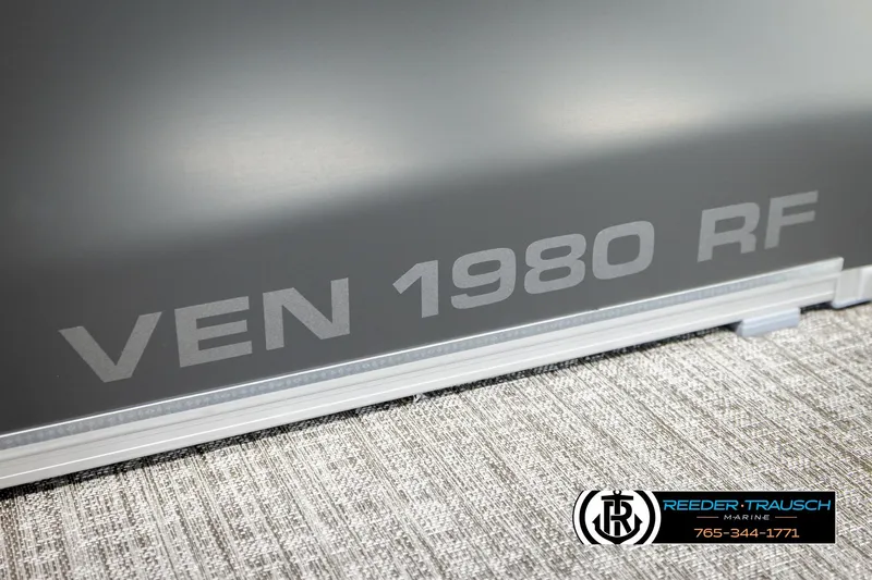 Slide: The Image of 2026 Avalon VEN RF boat detail with "VEN 1980 RF" text and Reeder-Trausch Marine logo. - 48