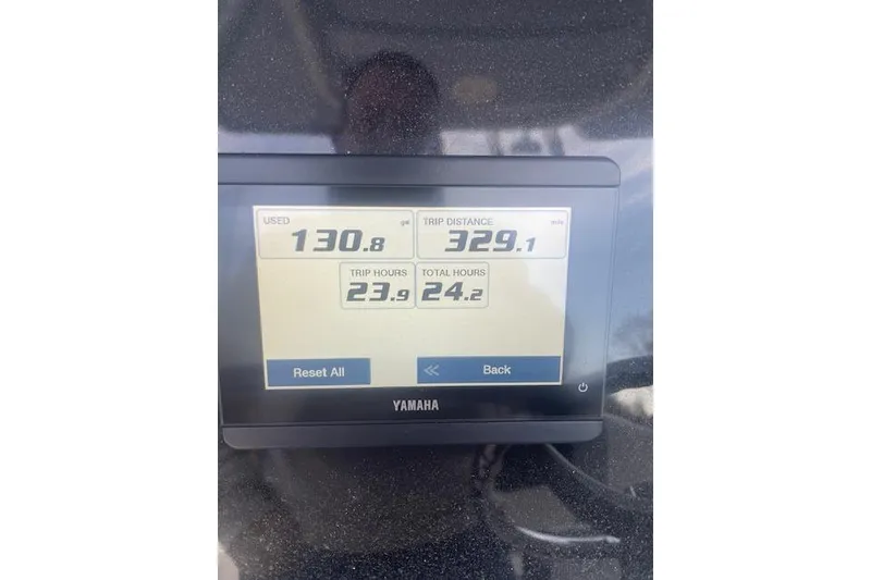 Slide: The Image of Yamaha display showing trip data on 2024 Robalo R230 Center Console boat. - 7