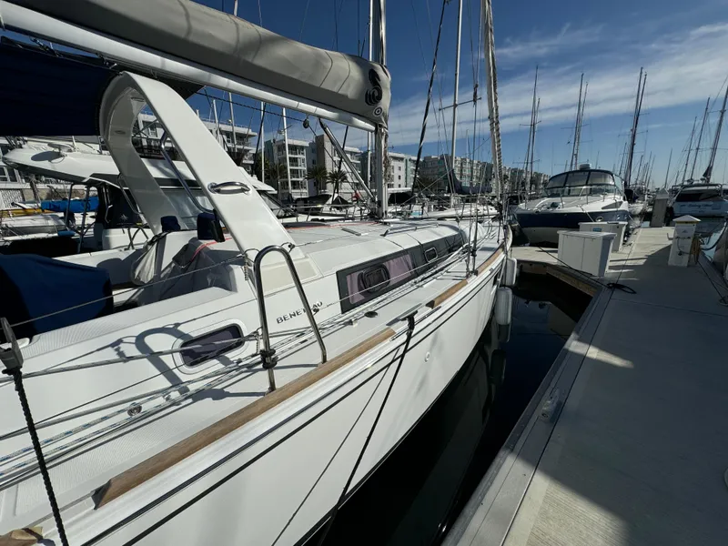 Slide: The Image of Beneteau Oceanis 35.1 sailboat docked at marina, 2021 model, sunny day. - 16