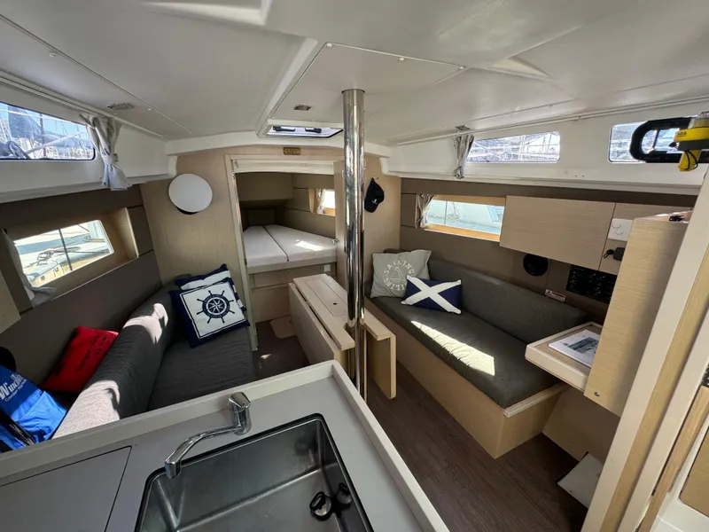 Slide: The Image of Interior of 2021 Beneteau Oceanis 35.1 yacht, featuring cozy seating and modern design. - 41
